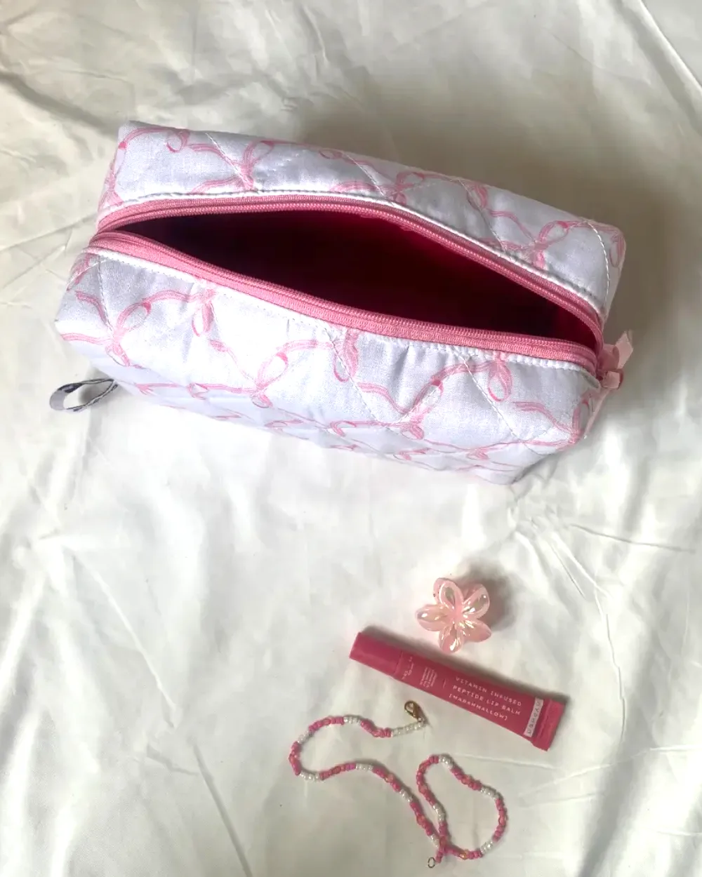 Blush bows pouch by Mogo